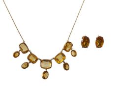A citrine drop necklace and earrings