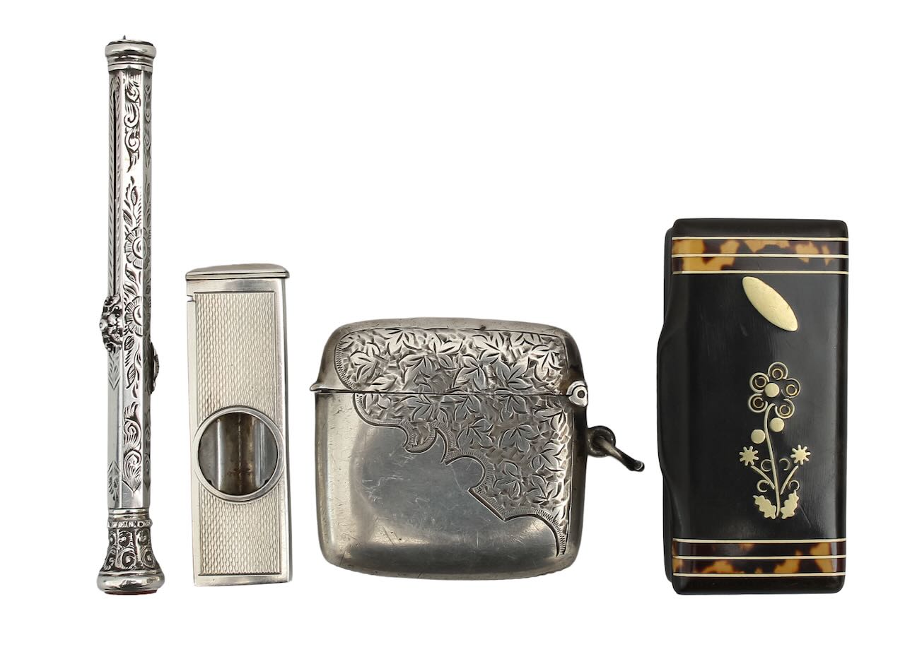 A group of silver vertu