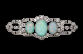 An Art Deco opal and diamond-set brooch