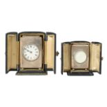 Two silver cased travel or carriage clocks