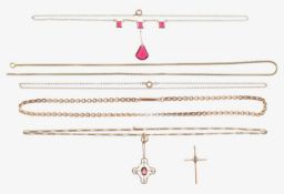 A collection of gold chains and pendants
