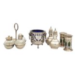 A group of silver cruet items