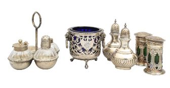 A group of silver cruet items