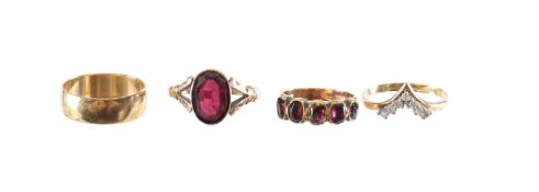 A early Victorian garnet half hoop ring with a single stone garnet ring and two more