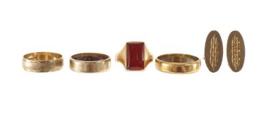 A group of gold band rings, signet ring and cufflinks