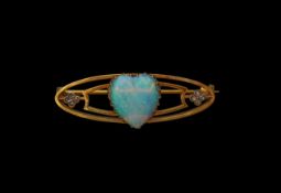 An opal heart brooch with diamonds