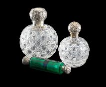 A Victorian silver mounted double ended scent bottle and two perfume bottles
