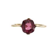 A single cushion cut garnet