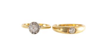 A diamond gypsy set ring and another diamond ring