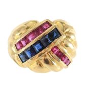 An 18ct gold, ruby and sapphire knot ring