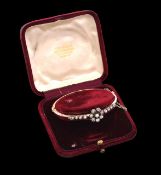 A mid Victorian pearl and diamond-set bangle