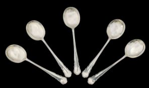 A set of six George IV silver Dubarry pattern soup spoons