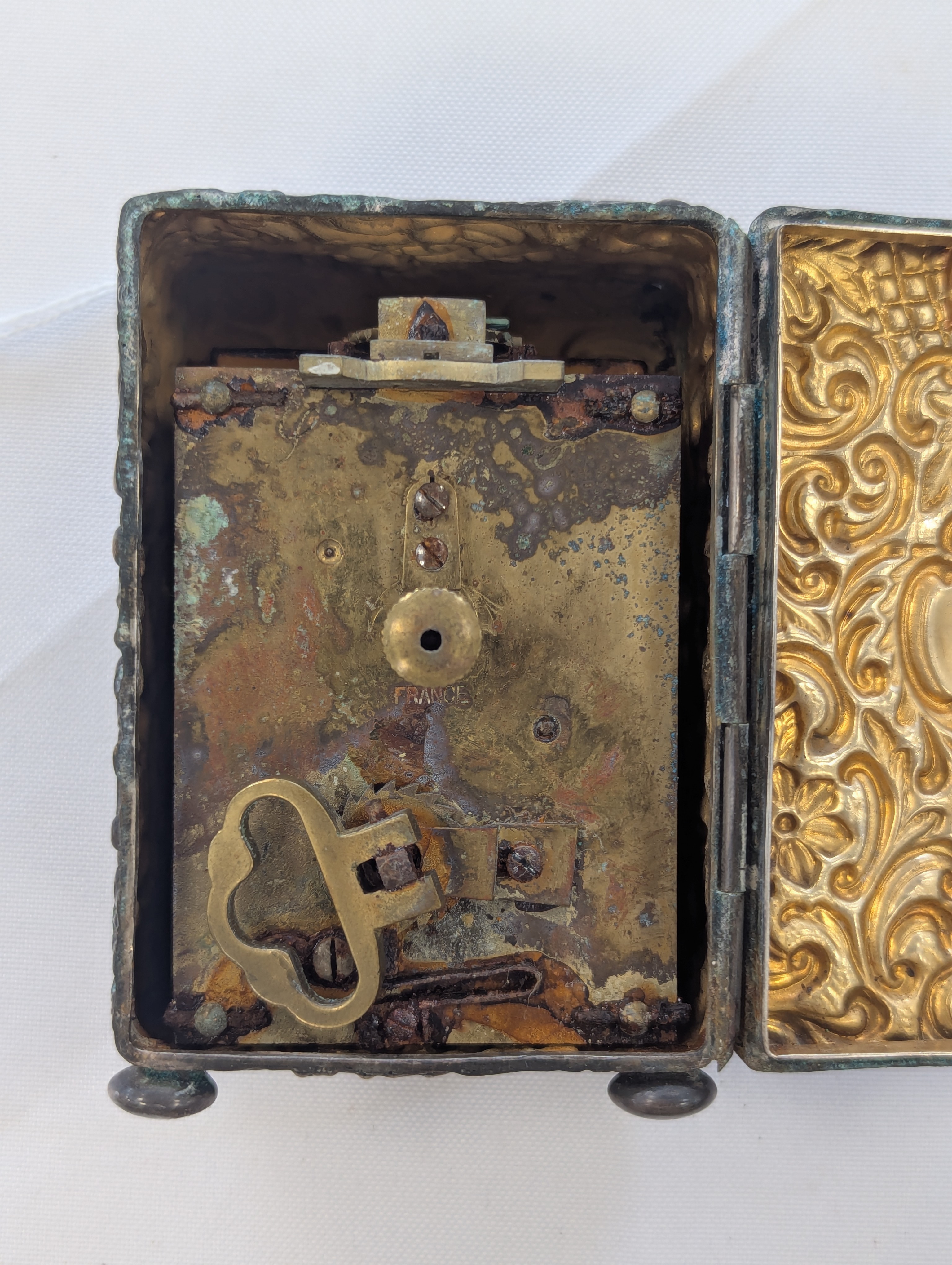 A pair of George V silver candlesticks, a silver carriage clock and a silver card case - Image 6 of 7