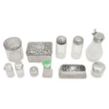 A collection of glass and silver mounted dressing table jars