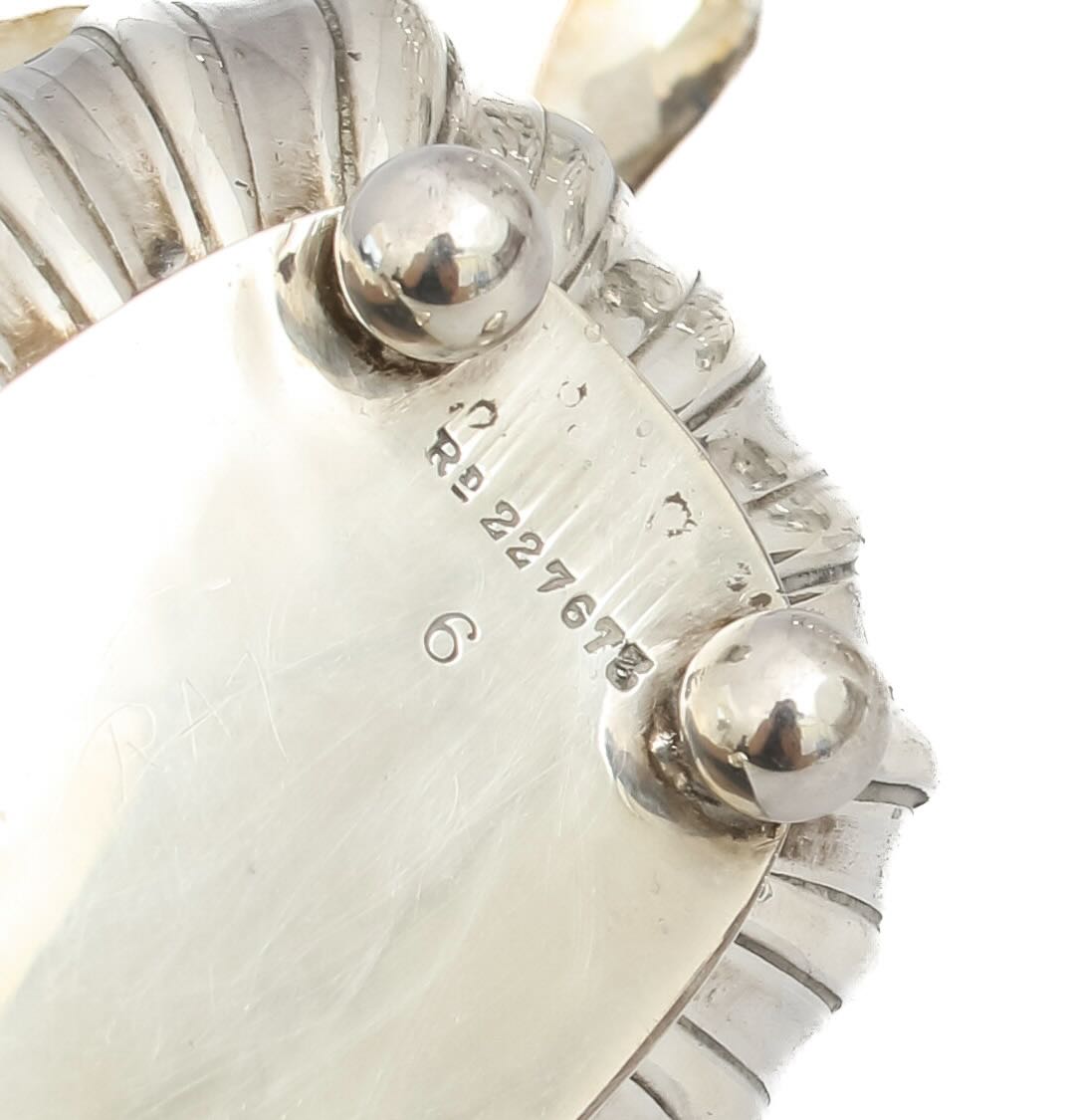 A George III silver cream jug, a toast rack, and a mustard pot - Image 2 of 5