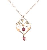 An Edwardian garnet and seed pearl pendant necklace
