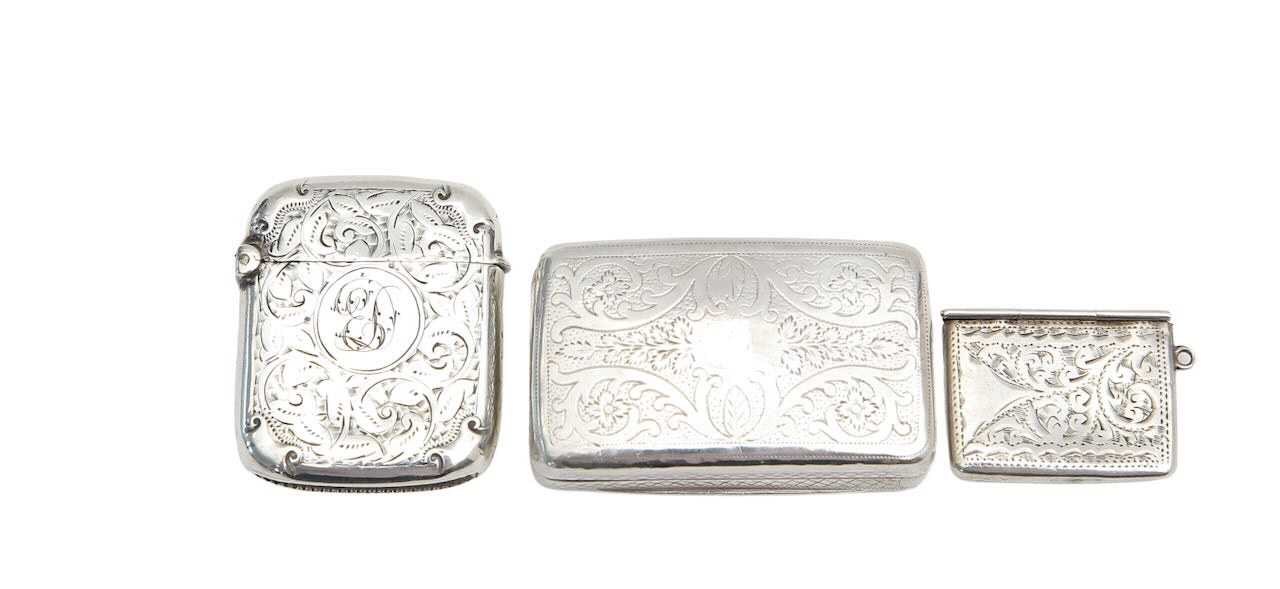 A George III silver snuffbox, a Victorian vesta case and a stamp box