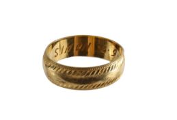 A 18ct gold band ring