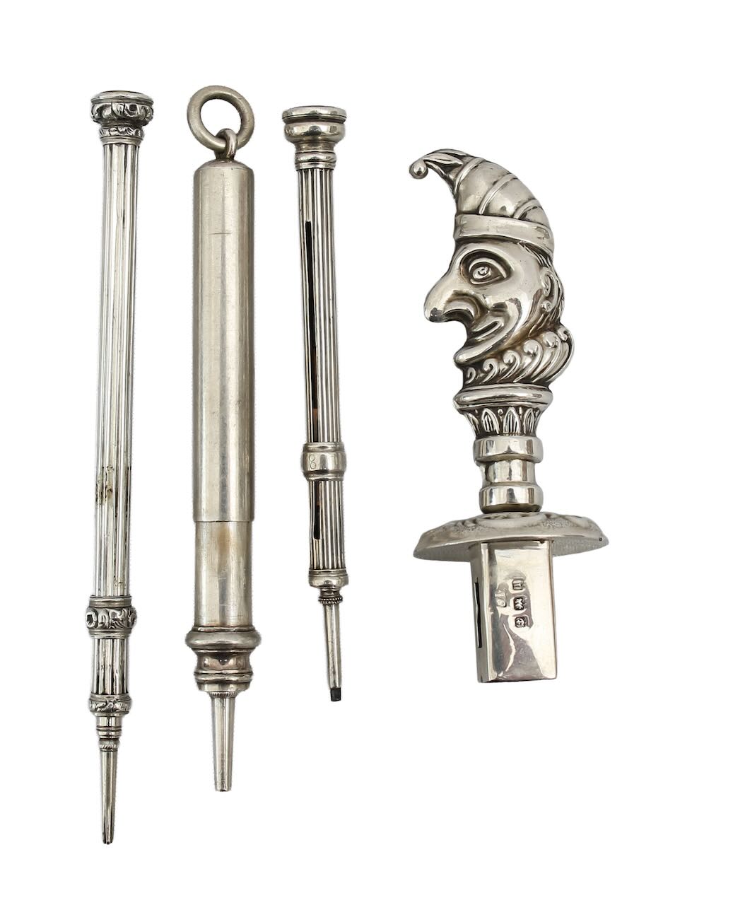 Three Sampson Mordan silver propelling pencils and a silver seal