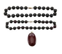 Two cherry amber necklaces and large pendant