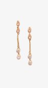 A pair of 18ct and diamond drop ear rings