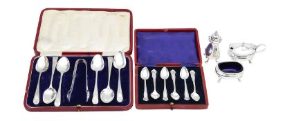 Two cased sets of silver spoons, and a silver cruet set