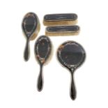 An Edward VII silver and tortoiseshell dressing table set,