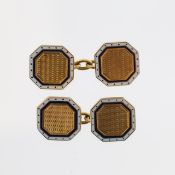 A pair of 18ct gold and enamelled cufflinks