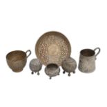 An Indian silver cruet set, two mugs and saucer