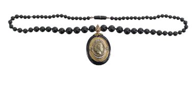 An onyx, lava stone and diamond-set necklace and pendant