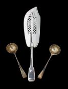 A George III silver fish slice and two George V silver ladles
