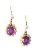 A pair of amethyst and pearl ear pendants