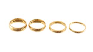 A collection of 22ct gold band rings