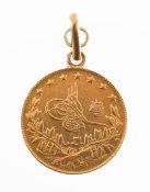 A Turkish kurush gold coin