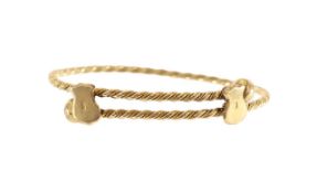 An 18ct gold adjustable twist bangle