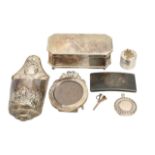 A group of silver dressing table items