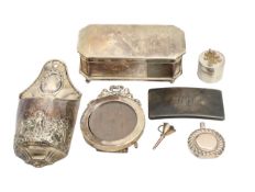 A group of silver dressing table items