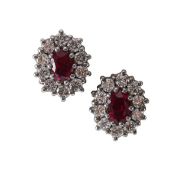 An 18ct gold, ruby and diamond cluster earrings