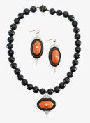 A coral, onyx and diamond-set demi parure