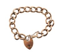 A 9ct gold curb link bracelet with heart padlock