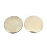 Two Kigu silver compacts