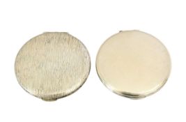 Two Kigu silver compacts