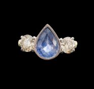 A sapphire and diamond three stone ring