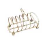 A Victorian silver six division toast rack