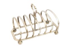 A Victorian silver six division toast rack