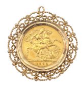 A George V 1929 gold full sovereign, in a 9ct gold mount