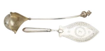 A George III Irish silver fish slice and a German silver ladle