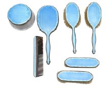 A silver and guilloché enamel dressing table set