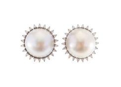 A pair of mabe pearl and diamond ear rings