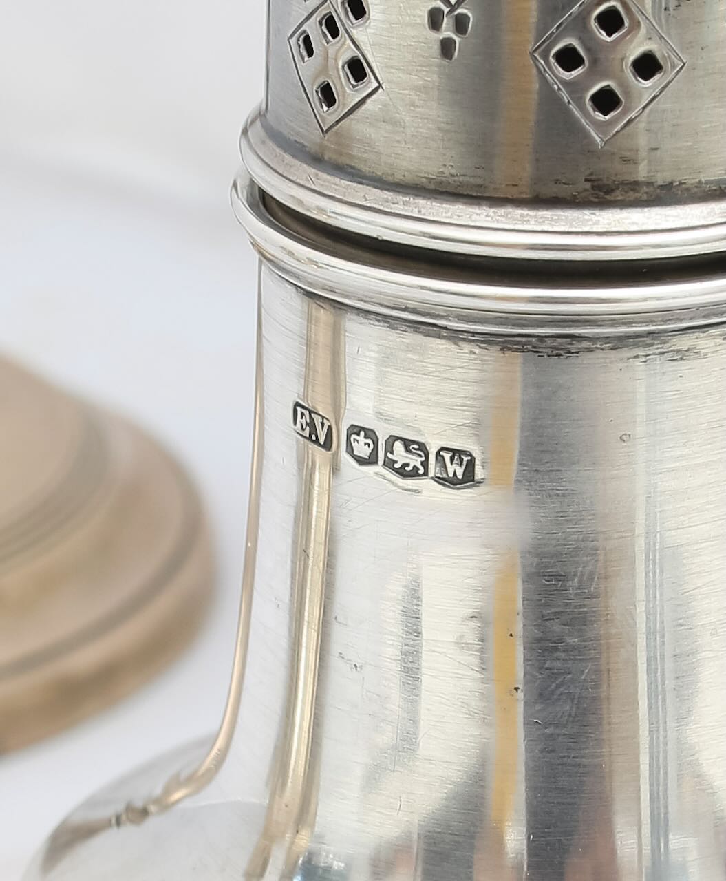 A collection of silver candlesticks, sifters and a cream jug - Image 4 of 4